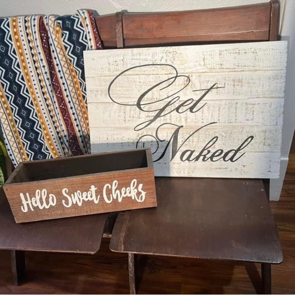 Wall sign and toilet shelf